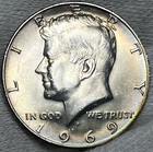 1969 D Kennedy Silver Dollar Rainbow Toning Uncirculated