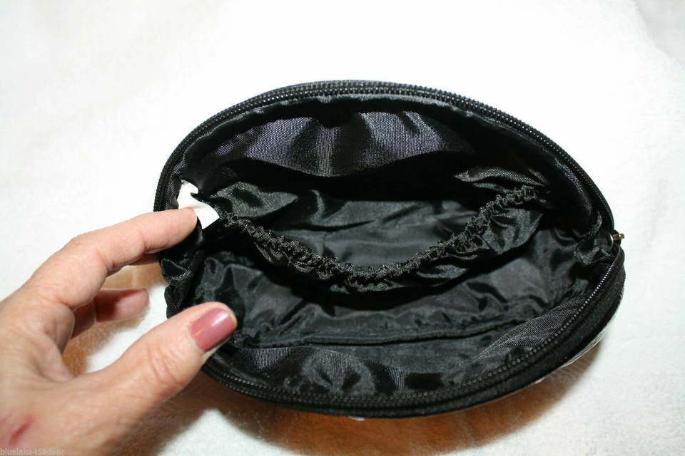 Loción hidratante Joan Rivers Beauty 2 piezas 6 oz + bolsa negra de cosméticos/maquillaje  Foto 2 de 2