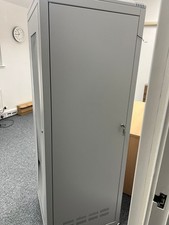 Large grey server cabinet with glass door