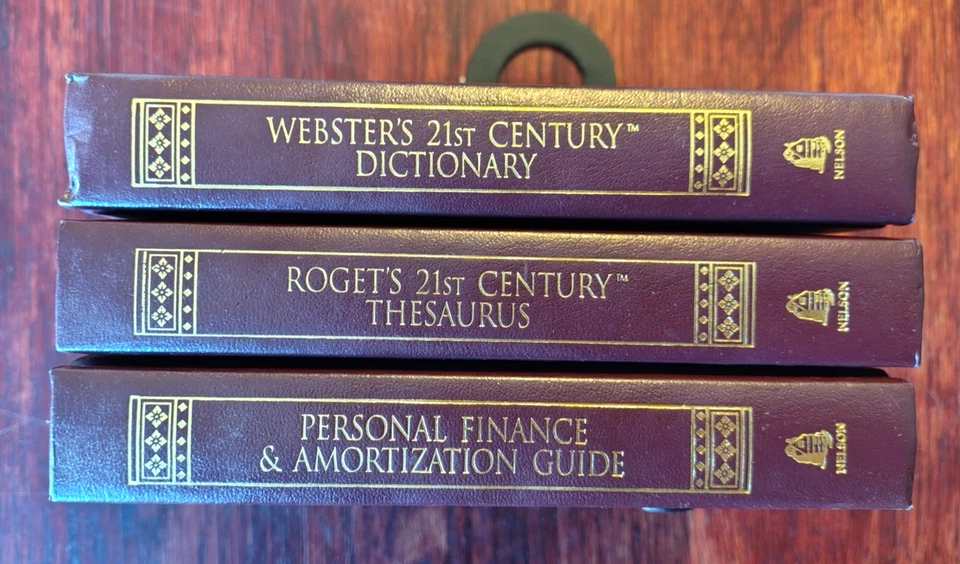 Lot 3 Webster's 21st Century Hardcovers, Dictionary, Thesaurus, Personal Finance - Image 2 of 3