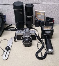 Minolta SRT101 Camera - 58,55  90mm-210mm - 3 Lenses, Flash, Case, Etc