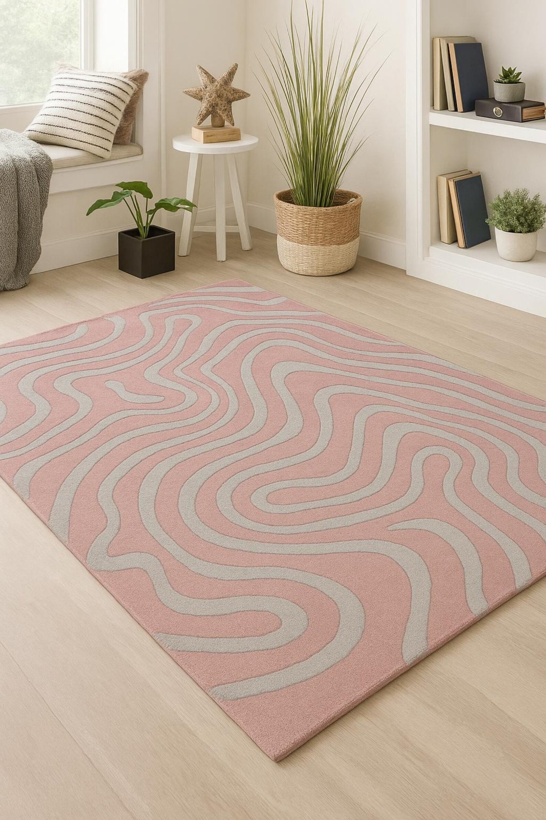 Modern hand tufted rug in soft pink and grey with abstract wavy geometric design