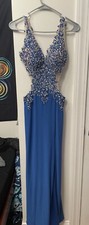 Light blue sparkly prom dress, open sides and back and slit size 1-3.