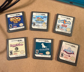 Nintendo 3DS Bundle - Console, Bag, Games, SD Card, Case, Charger