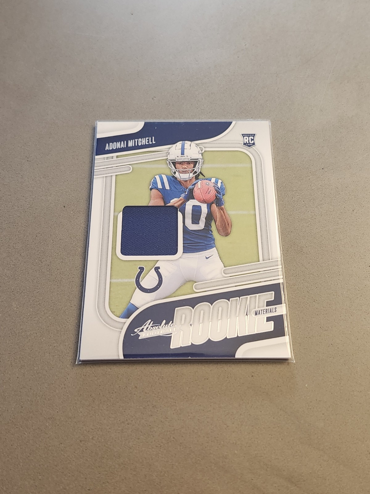 Adonai Mitchell Panini Absolute Absolute Rookie Materials #ARMAML Base