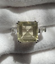 10-Carat Lemon Yellow Topaz And .6 Ct. tw White Topaz Ring Sterling Silver Sz 5