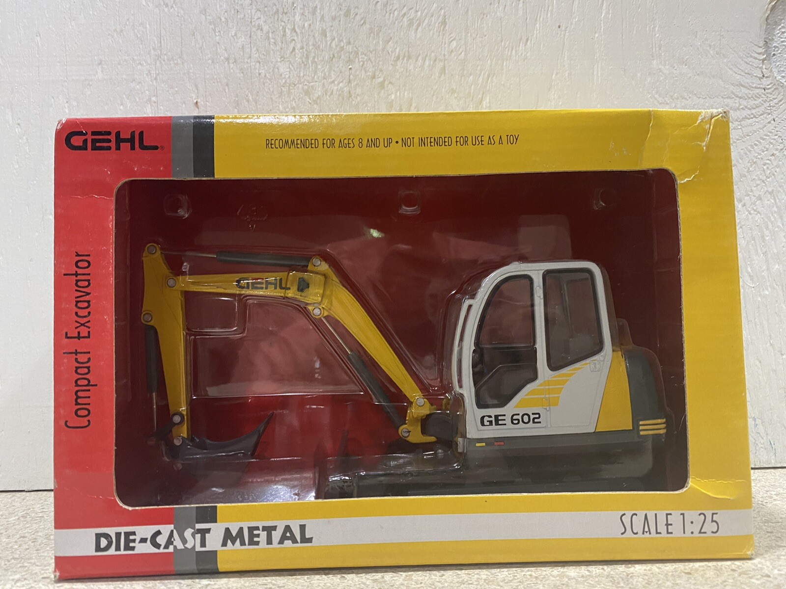 Gehl Model GE 602 Compact Excavator by Die-Cast Promotions 1/25th Scale  - NIB