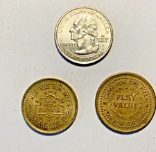 VINTAGE TOKENS SHOWBIZ PIZZA COIN OR TOKEN LOT OF TWO THEY ARE DIFFERENT SIZES