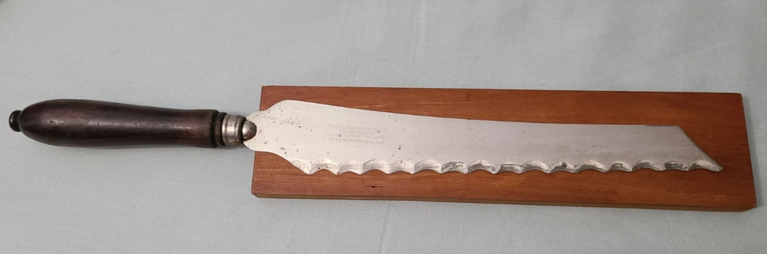 Antique Landers Frary & Clark serrated Aetna Bread Knife w wood handle Pat 1886