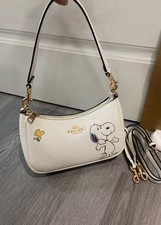 Coach White Peanuts Snoopy Woodstock Small Crescent Shoulder Bag Zip Strap Charm