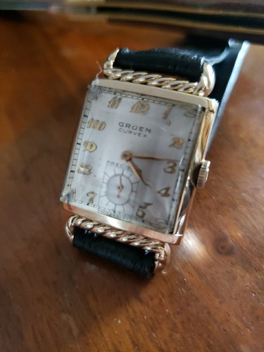 GRUEN GOLD FILLED CURVEX ROPE GOLD FILLED BEZEL CASE AND SERVICED 1939