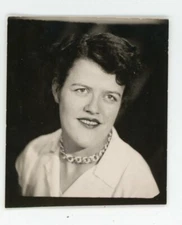1958 ID PHOTO, a woman poses smile necklace jewelry blouse hairstyle
