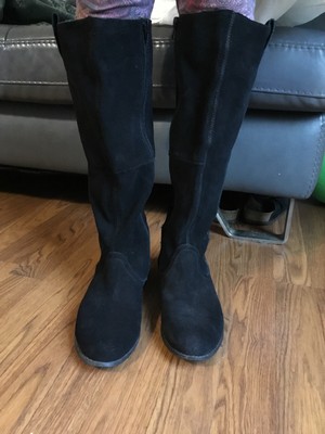 very volatile knee high boots