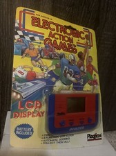 Vintage Invader space racing game mini handheld LCD digital sound blue red 1980s image