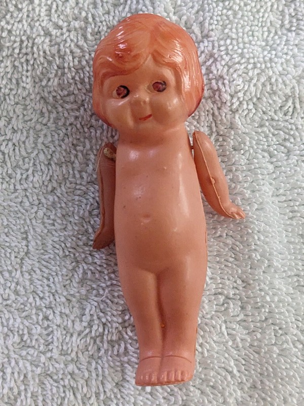 4 1/4" Celluloid girl doll Nude Made in Japan Has K on her back Jointed arms