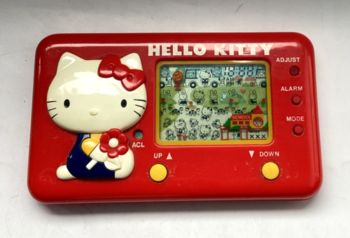 Vintage RARE 1983 TOMY - HELLO KITTY SCHOOL BUS - LCD Game (Very Good Condition)