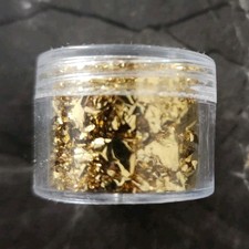 Gold Leaf Flakes in Small Clear Plastic Container