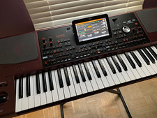 Korg Pa1000 61-Key Semi-Weighted Arranger Keyboard w/ Speakers, Stand, Red