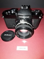 Corpo nero Nikkormat FT3 con obiettivo Nikon Nikkor 50 mm f/1.8