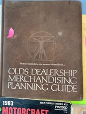 Oldsmobile dealer binder;  leather cover.   Item:  18924