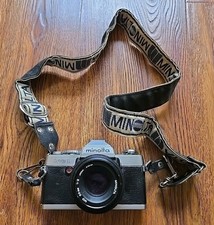 Minolta XG-1 Camera with Minolta 50mm Lens  Vtg Strap. Untested Camera.