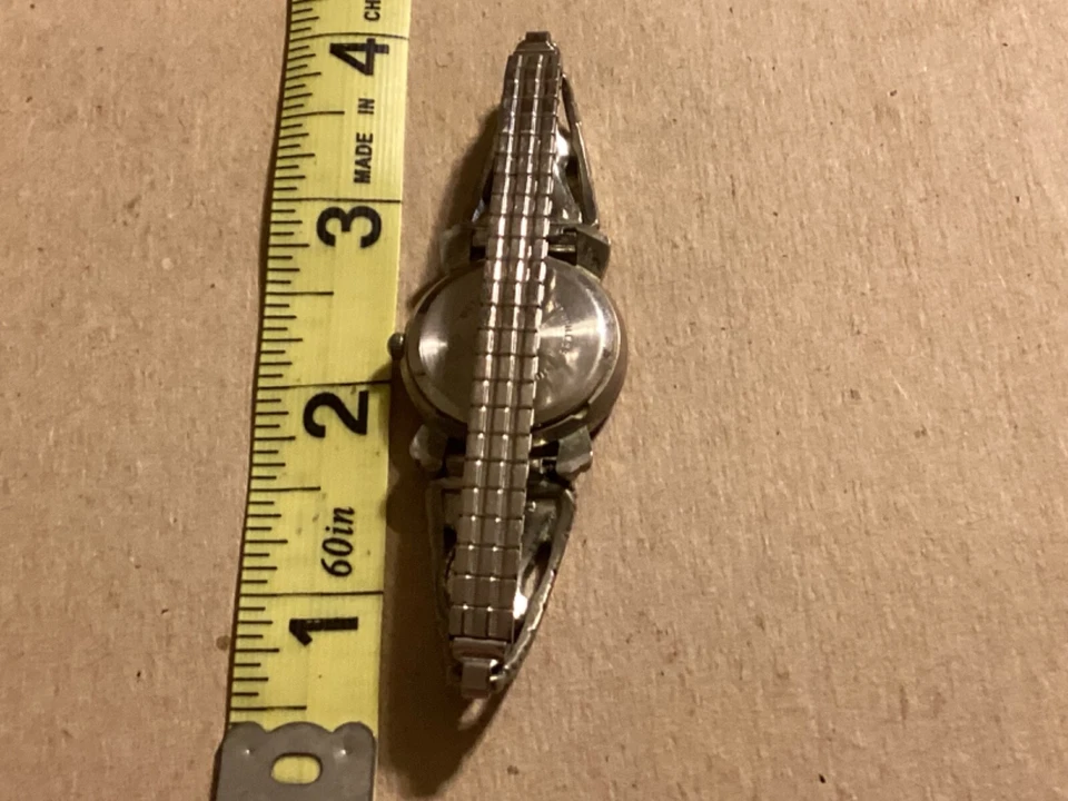 Reloj de mujer COLLEZIO cara blanca - correa plateada flexible - batería nueva - funciona Foto 3 de 4