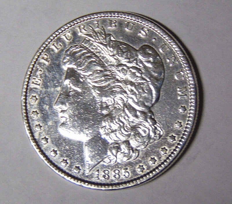 AU 1885-P Morgan Silver Dollar Cleaned Polished Philadelphia Mint Coin (mrmtb4)
