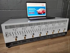 Charge-discharge tester for high-voltage batteries of hybrid vehicles