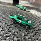 Hot Wheels redlines 1970 spoilers green  Nitty Gritty Kitty champagne interior