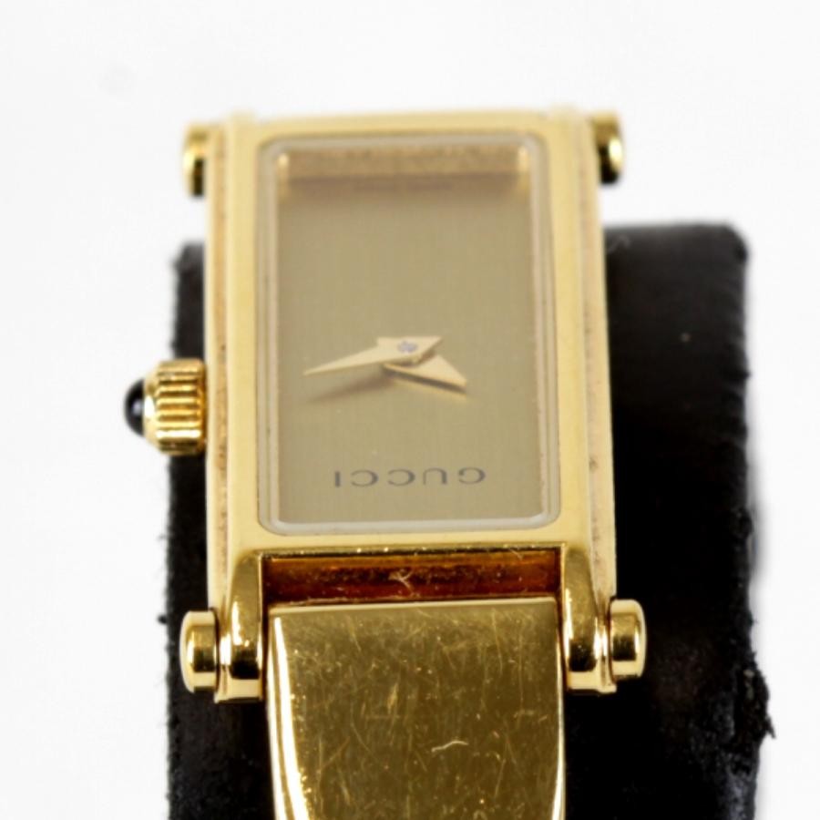 Ladies Gucci Gold Tone Black Dial 1500 Bangle Watch for sale Ladies Gucci Gold Tone Black Dial 1500 Bangle Watch for sale