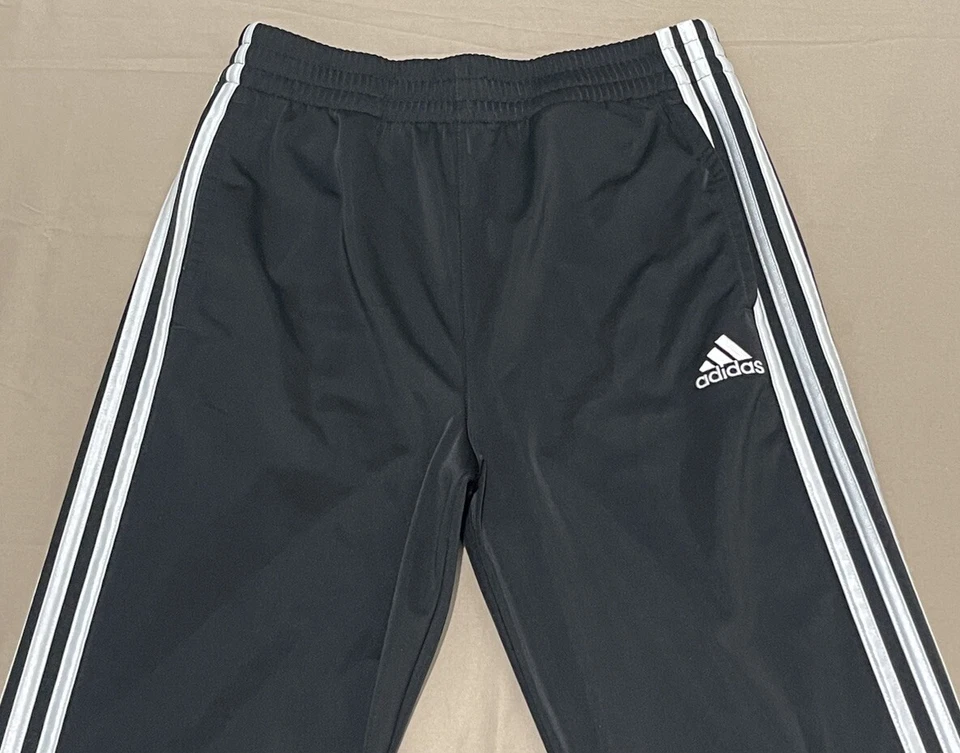 Pantalones activos Adidas para niños talla L 14-16 a rayas cintura elástica pierna recta negros Foto 3 de 4