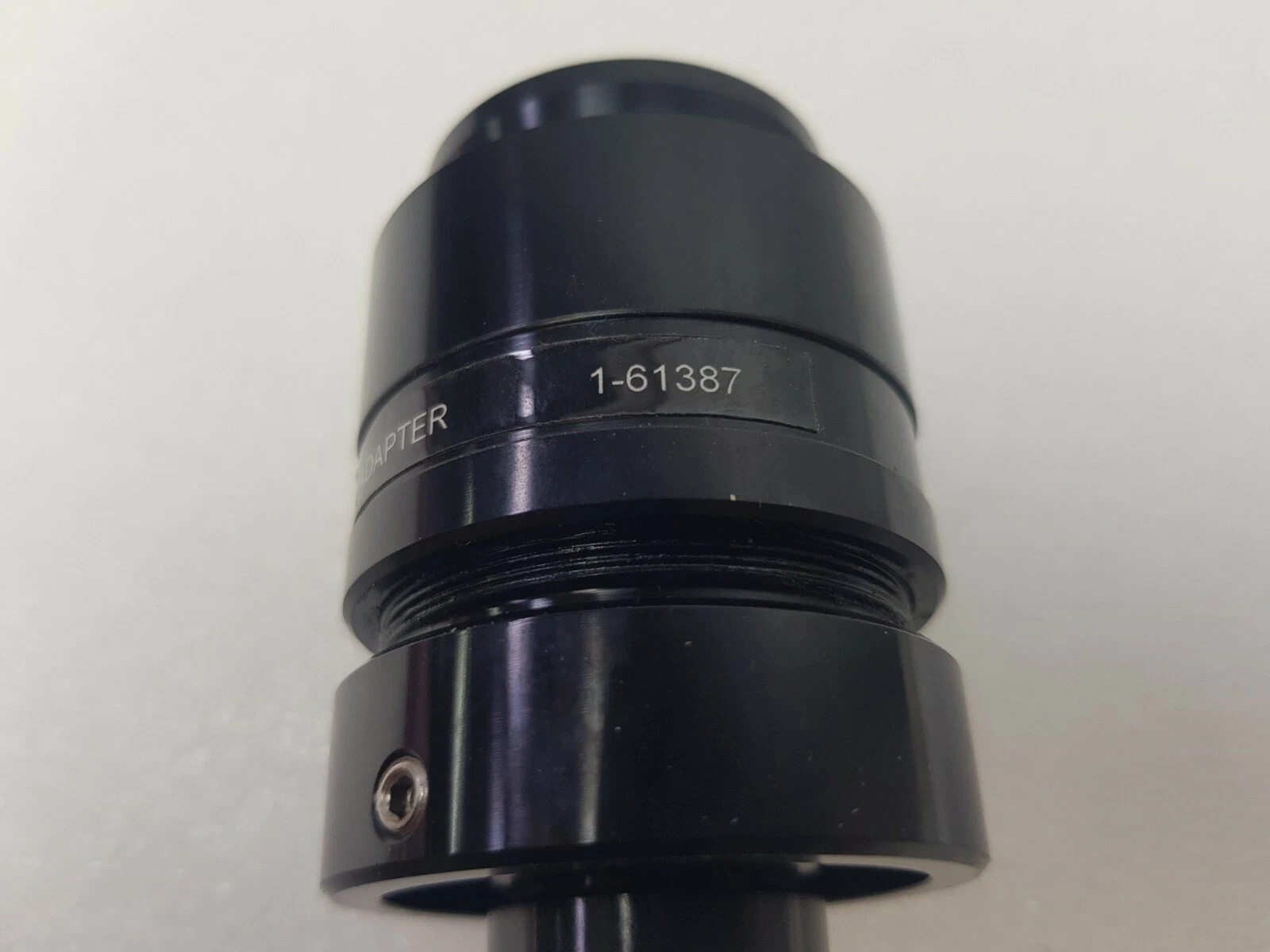Part number 1-61387 engraved on the Navitar 1.33X mini adapter