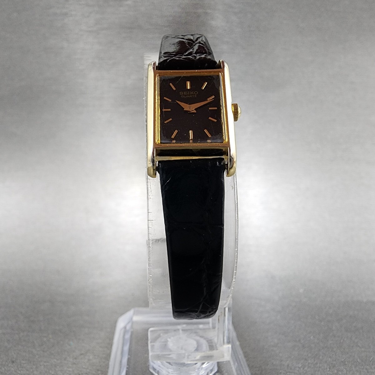 Seiko Tank Watch Women 14mm Black Dial Gold Tone Rectangle 1F20