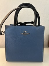 Coach Blue Pebbled Top Handle Satchel Bag with Logo Accent and Magnetic Closure