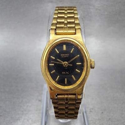 Seiko SX Watch Women 17mm Black Dial Gold Tone Oval V401-5101 New