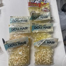 Lot Of 7 Packages Of Small And Large Curly Doll Hair In Yellow Blondes. A21