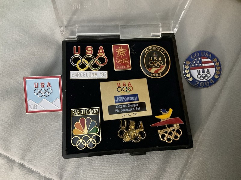 9 Different Olympics Pins - Excellent Condition - In Case