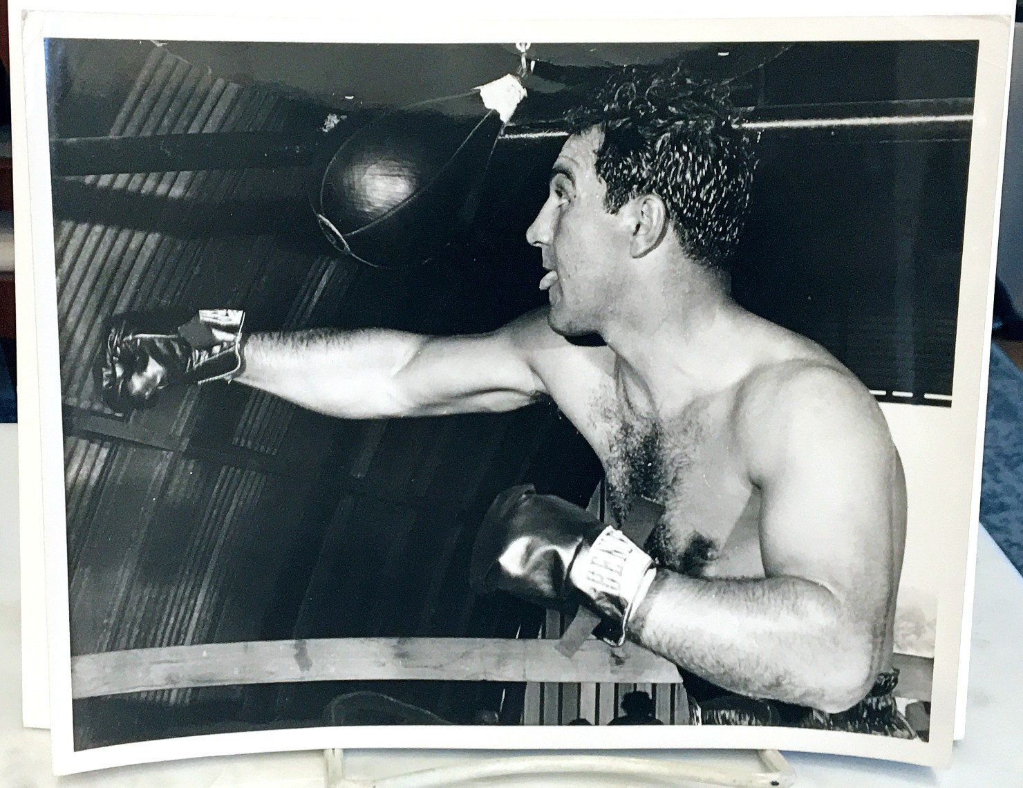ROCKY MARCIANO ORIGINAL TYPE 1 PHOTO (8 x 10")--w/PUNCHING BAG by STANLEY WESTON