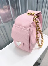 quilted bag with pockets and chain