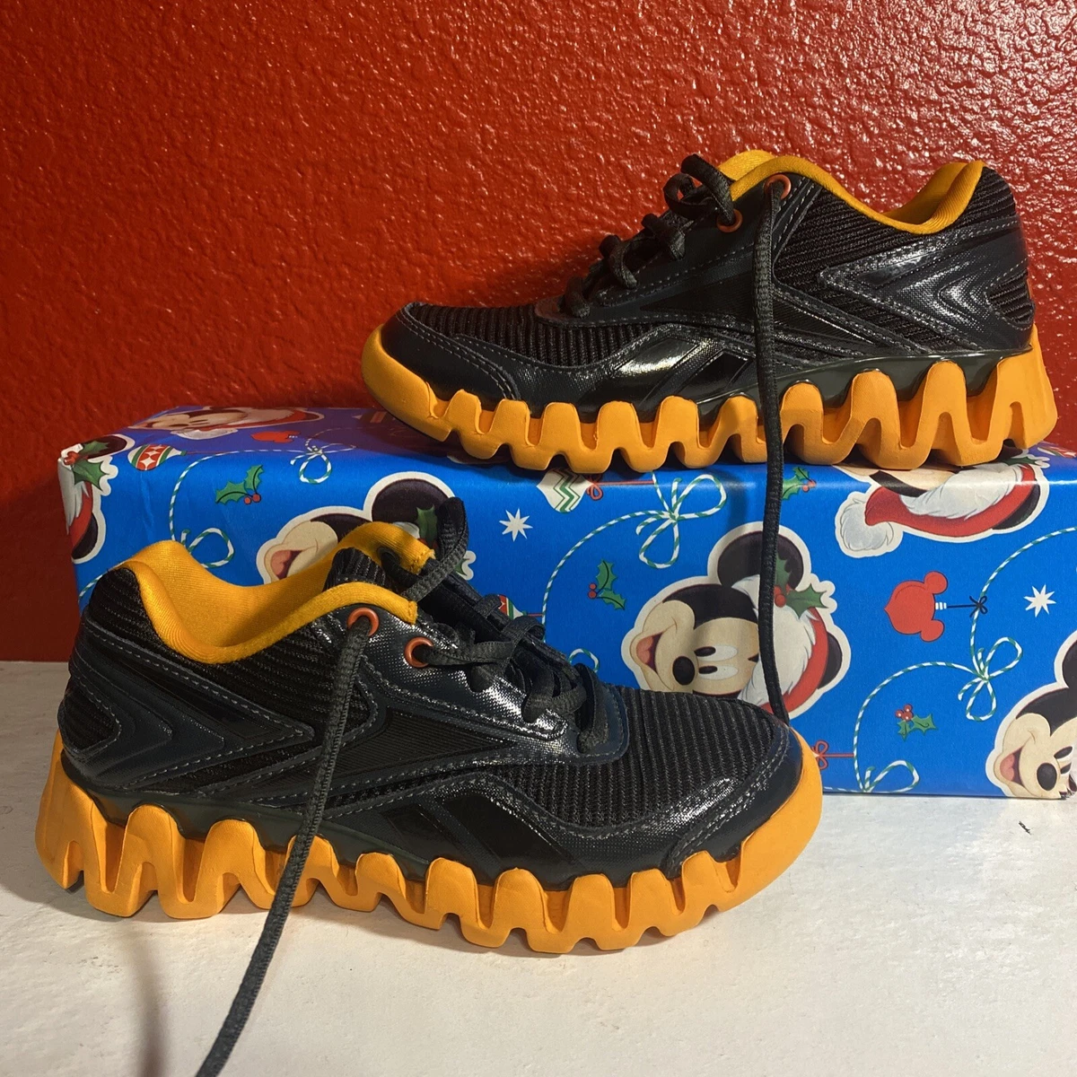 Reebok Zig Activate ps size 12 J88319 Black Gravel Orange eBay
