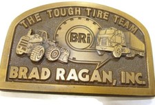 Vintage Brad Ragan Inc. Belt Buckle The Tough Tire Team Spec-Cast