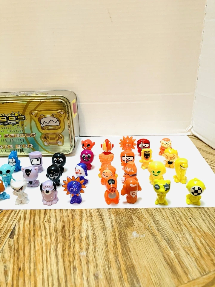Gogo’s Crazy Bones Gold Series 1 Tin With 50 Figures Some Rare Read JDNA 2010 - Image 4 of 4