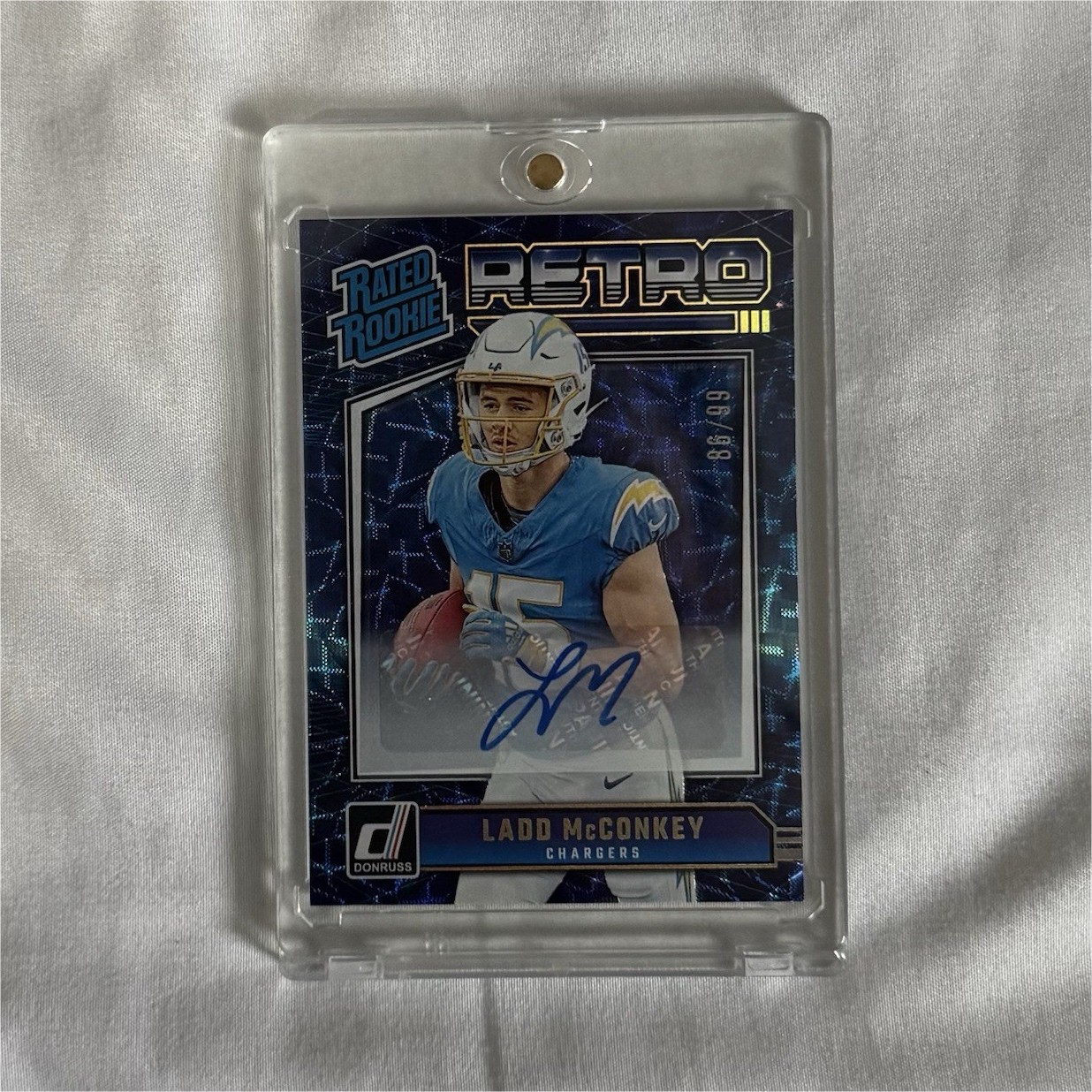 2024 Panini Donruss Rated Rookie Retro Ladd McConkey #5 Autograph /99 Chargers