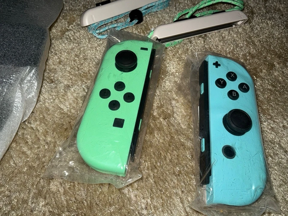 Genuine Nintendo Switch Animal Crossing Joy-Con Set Controllers + Straps + Grip - Image 3 of 4