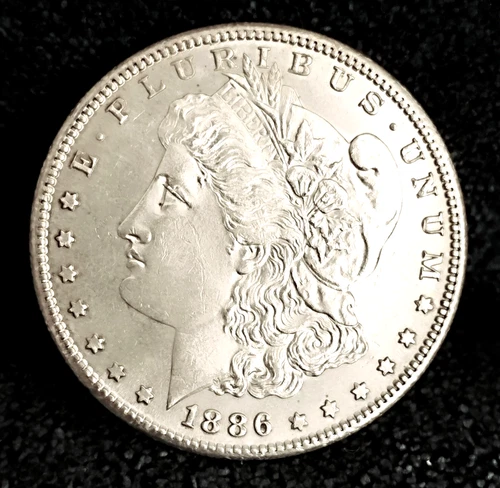 1886 S Morgan Dollar MS+ Great Eye Appeal Excellent Strike. 100% Original White