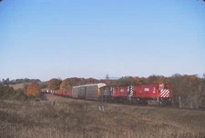CP RAIL   4561  M630+2  & FREIGHT ACTION NEAR NEWTONVILLE, ON 1991  35MM SLIDE