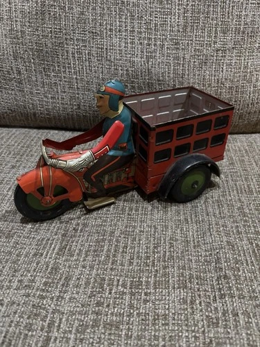 Vintage Marx tin wind-up "Speed Boy” delivery motorcycle toy 1930s