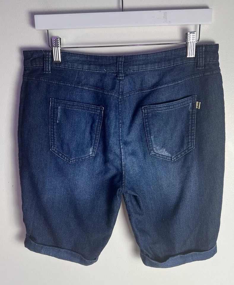 Bermudas cortas ligeras elásticas puño desgastado lavado oscuro Juicy Couture talla 10 Foto 2 de 4