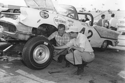 Lee Petty tire representative check out rubber before installing i- Old Photo