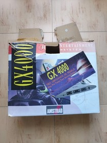 Amstrad GX 4000 Video Game Console Burnin' Rubber and original box and instructi